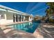 Private swimming pool with outdoor patio area, perfect for relaxing and entertaining at 102 23Rd St, Belleair Beach, FL 33786