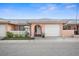 Charming single-story home with a well-maintained yard and attached garage at 10467 Larchmont N Pl, Pinellas Park, FL 33782