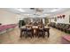 A view of the tables in the library at 10467 Larchmont N Pl, Pinellas Park, FL 33782