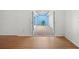Enclosed patio with brick floor, blue accent wall, and covered skylight at 10467 Larchmont N Pl, Pinellas Park, FL 33782