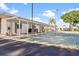 Outdoor shuffleboard courts with covered seating area for players and spectators at 10467 Larchmont N Pl, Pinellas Park, FL 33782