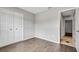 Unfurnished bedroom with wood flooring and a closet for added storage at 105 Lotus Cir, Safety Harbor, FL 34695