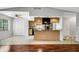 Kitchen featuring granite countertops, stainless steel appliances, and tile flooring at 105 Lotus Cir, Safety Harbor, FL 34695