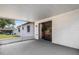 The screened in lanai connects the house to the backyard through a sliding glass door at 105 Lotus Cir, Safety Harbor, FL 34695