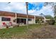 Relaxing backyard with a covered patio and plenty of room for outdoor activities at 1273 Mission Cir, Clearwater, FL 33759