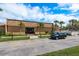 Well-maintained building exterior with neat landscaping, offering a community pool at 1273 Mission Cir, Clearwater, FL 33759