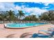 Sparkling outdoor pool with comfortable lounge chairs for sunbathing and relaxation at 1273 Mission Cir, Clearwater, FL 33759