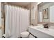 This bathroom features a white shower curtain, modern vanity, and stylish decor for a relaxing atmosphere at 1731 Elk Spring Dr, Brandon, FL 33511