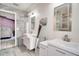 Bright bathroom features double sinks, modern fixtures, and a sleek, glass-enclosed shower at 1731 Elk Spring Dr, Brandon, FL 33511