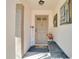 Welcoming front entrance featuring a charming front door, a decorative welcome sign, and a cozy bench at 1731 Elk Spring Dr, Brandon, FL 33511