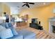 Comfortable living room features hardwood floors, fireplace and vaulted ceilings at 1731 Elk Spring Dr, Brandon, FL 33511