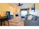 Comfortable living room features hardwood floors and a modern fireplace at 1731 Elk Spring Dr, Brandon, FL 33511