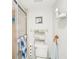 Clean and well-organized bathroom with a glass-enclosed shower and neutral color palette at 1800 Mariner Dr # 9, Tarpon Springs, FL 34689