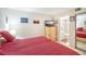 Comfortable bedroom with a calming color scheme, functional furniture, and a relaxing retreat at 1800 Mariner Dr # 9, Tarpon Springs, FL 34689
