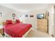 Inviting bedroom with a tranquil ambiance, soft lighting, and tasteful décor at 1800 Mariner Dr # 9, Tarpon Springs, FL 34689