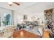 Open-concept living space with hardwood flooring and plenty of natural light at 1800 Mariner Dr # 9, Tarpon Springs, FL 34689