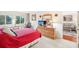 Comfortable main bedroom showcasing neutral tones, ample closet space, and a serene atmosphere at 1800 Mariner Dr # 9, Tarpon Springs, FL 34689