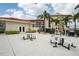 Outdoor patio space with comfortable seating, perfect for relaxing and enjoying the community's outdoor grill and picnic area at 1800 Mariner Dr # 9, Tarpon Springs, FL 34689