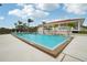 Take a dip in the expansive swimming pool, perfect for relaxation and recreation, with lounge seating at 1800 Mariner Dr # 9, Tarpon Springs, FL 34689