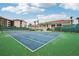 Enjoy a match on this well-maintained tennis court with lush surroundings and beautiful architecture at 1800 Mariner Dr # 9, Tarpon Springs, FL 34689