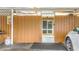 View of the carport with partial view of a white car on the right side at 1884 Clearbrooke Dr # 1884, Clearwater, FL 33760