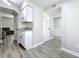 Hallway featuring a connection to the kitchen, living room, and bedrooms at 1884 Clearbrooke Dr # 1884, Clearwater, FL 33760