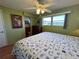 Sunny bedroom with comfortable bed and view to adjacent bathroom at 2331 Belleair Rd # 527, Clearwater, FL 33764