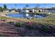 Beautiful community pond surrounded by rocks and flower gardens, offering a relaxing and scenic retreat at 2331 Belleair Rd # 527, Clearwater, FL 33764