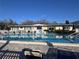 Sparkling community pool with lounge chairs, offering a refreshing oasis for relaxation and social gatherings at 2331 Belleair Rd # 527, Clearwater, FL 33764