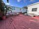 A spacious wooden deck with railing provides an ideal setting for enjoying outdoor living and views at 2331 Belleair Rd # 527, Clearwater, FL 33764