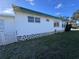 Well-maintained home exterior, emphasizing the property's cleanliness, architectural features, and yard at 2331 Belleair Rd # 527, Clearwater, FL 33764