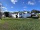 Attractive home exterior, showing the home's architectural style, outdoor space, and position on the lot at 2331 Belleair Rd # 527, Clearwater, FL 33764