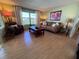 Inviting living room with comfortable seating and natural light at 2331 Belleair Rd # 527, Clearwater, FL 33764
