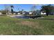Community pond with fountain surrounded by well-maintained landscaping at 2331 Belleair Rd # 527, Clearwater, FL 33764