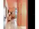 Hallway with modern decor, stylish lighting, and scenic outdoor views from a window at the end at 2912 W Santiago St # 1504, Tampa, FL 33629