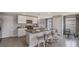 Stylish kitchen with barstool seating at island, stainless appliances and modern finishes at 2954 Rock Sound St, Bradenton, FL 34208
