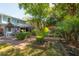The backyard features a patio, storage shed and manicured garden at 3116 W Wallcraft, Tampa, FL 33611