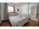 Comfortable bedroom with hardwood floors, double closets, and bright window at 3116 W Wallcraft, Tampa, FL 33611