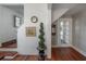 Inviting foyer with hardwood floors, staircase, and decorative accents at 3116 W Wallcraft, Tampa, FL 33611