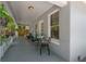 Spacious covered front porch with ample seating and natural light at 3116 W Wallcraft, Tampa, FL 33611