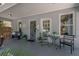 Inviting front porch with comfortable seating and view of the neighborhood at 3116 W Wallcraft, Tampa, FL 33611