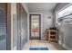 Hallway with tiled floors, closet, and view to the outside backyard patio at 3116 W Wallcraft, Tampa, FL 33611