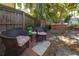 Private backyard hot tub area with comfortable seating and lush tropical landscaping at 3116 W Wallcraft, Tampa, FL 33611