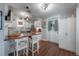 Kitchen featuring white cabinetry, a butcher block island with seating, and stainless steel appliances at 3116 W Wallcraft, Tampa, FL 33611