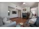 Cozy living room features a fireplace, hardwood floors, and comfortable seating, creating a welcoming ambiance at 3116 W Wallcraft, Tampa, FL 33611