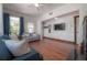 Comfortable living room showcasing hardwood floors and stylish decor at 3116 W Wallcraft, Tampa, FL 33611