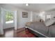 Comfortable main bedroom with plenty of natural light coming in from large windows at 3116 W Wallcraft, Tampa, FL 33611