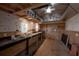 Inside the shed with a workbench, shelving, and natural light at 3116 W Wallcraft, Tampa, FL 33611