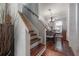 Inviting staircase with hardwood steps and decorative tile risers, leading to the upper level at 3116 W Wallcraft, Tampa, FL 33611