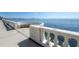 Scenic waterfront view featuring a concrete balustrade with a built in bench, and city skyline in the distance at 3116 W Wallcraft, Tampa, FL 33611